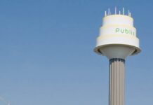 Why We Include Publix In Our Florida Travel Plans a photo of the Publix birthday cake shaped water tower.